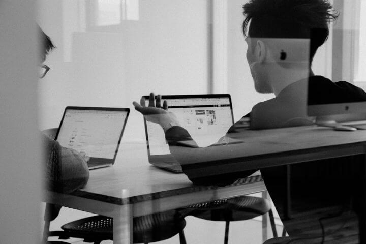Virtual assistant working on laptop
